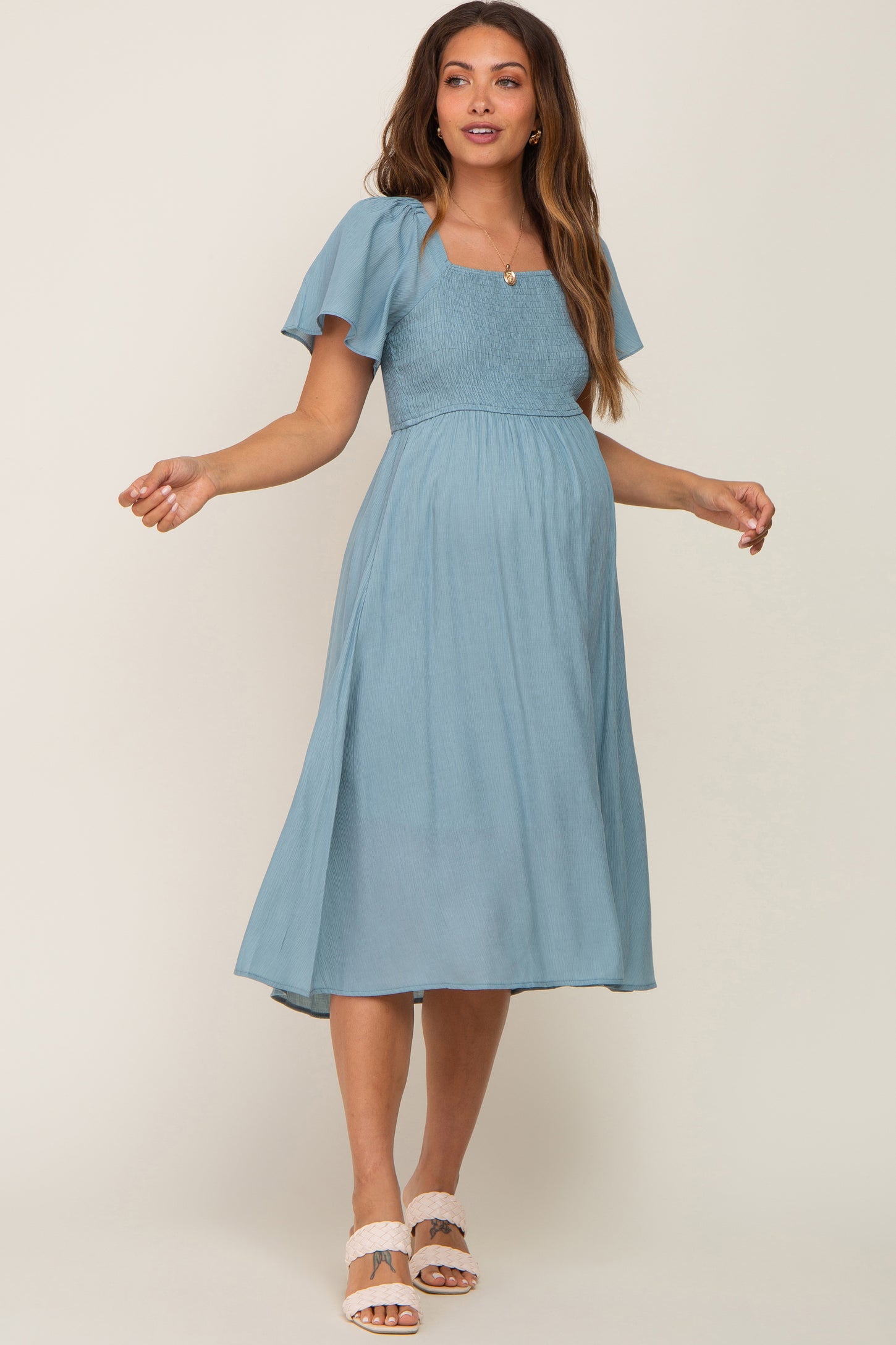 blue maternity cocktail dress Marion Ruffle Hem Short Sleeve Knit Maternity Dress in Blue
