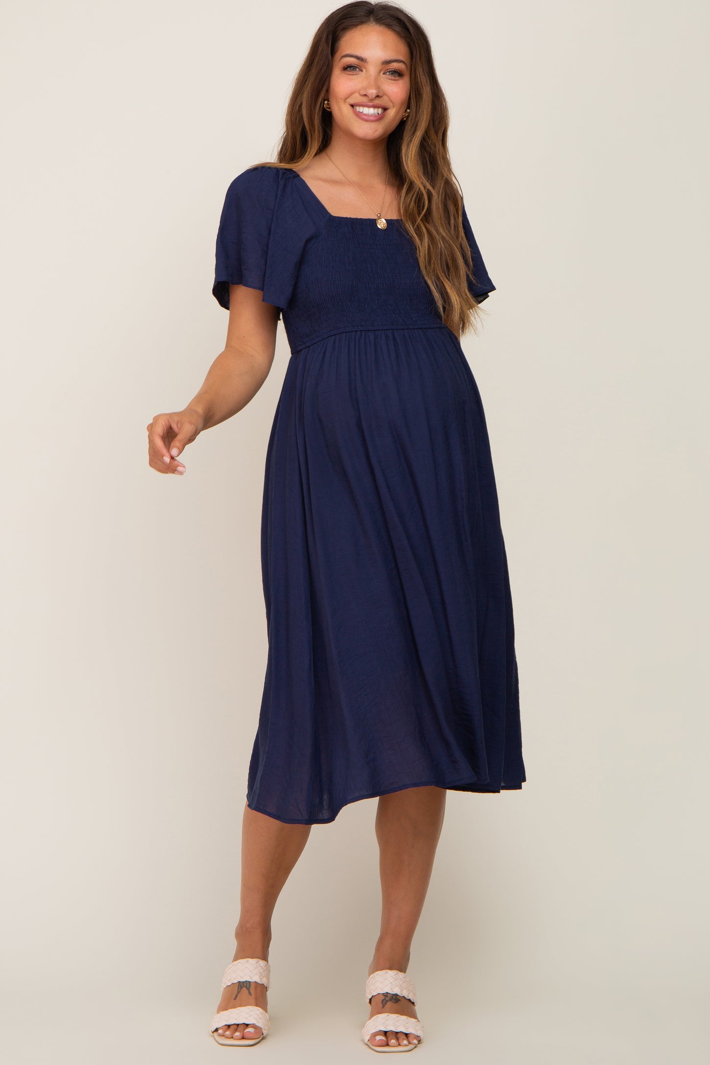 blue midi dress with short sleeves Loveland Cap Sleeve Cowl Back Midi Dress Baby Blue main image 0