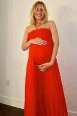 Orange Smocked Halter Maternity Maxi Dress