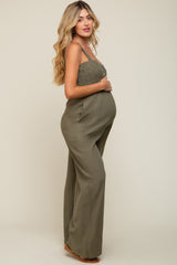 Olive Smocked Button Accent Linen Maternity Jumpsuit