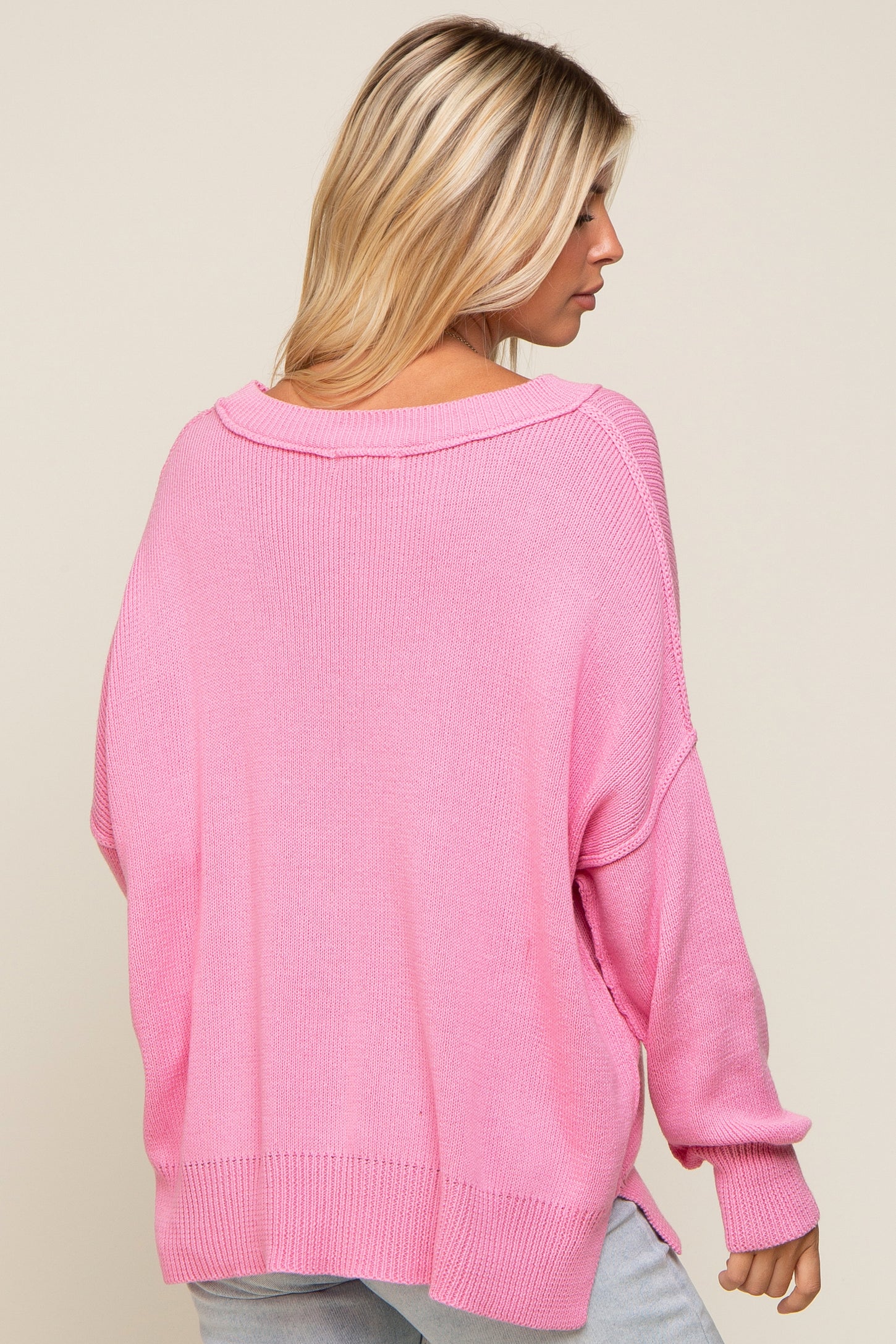 Pink Exposed Seam Side Slit Sweater