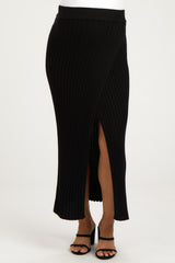 woman wearing a black ribbed maternity skirt with a high slit and a comfortable waistband