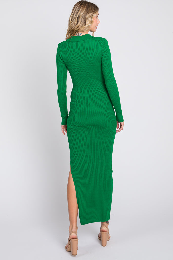 woman wearing a green ribbed maxi dress with long sleeves and side slit