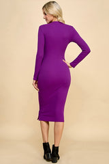 woman wearing a long sleeve purple ribbed midi dress with button details on the side, view from the back