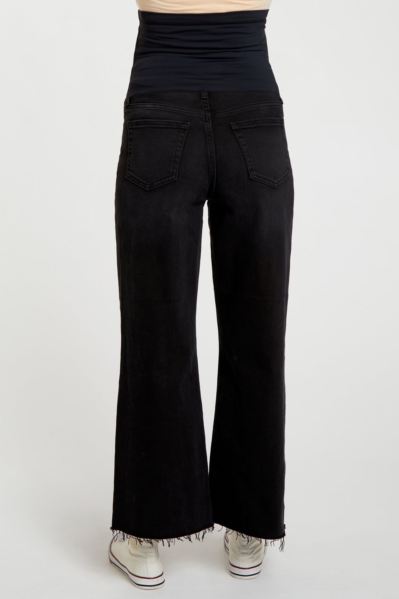 black maternity jeans with a wide leg and stretchy waistband, model showing the back view