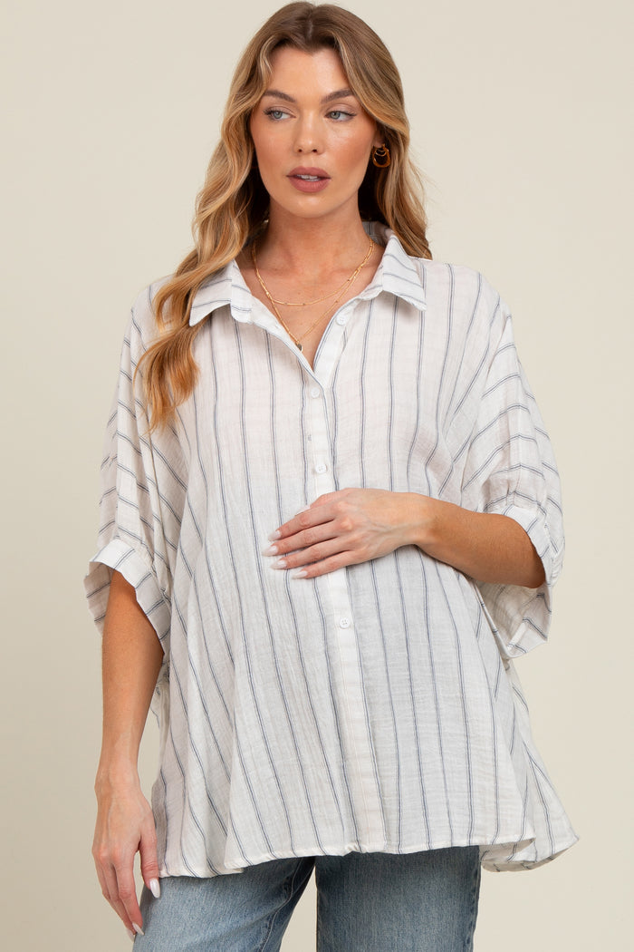 woman wearing a striped white and blue maternity shirt with a relaxed fit and a visible baby bump