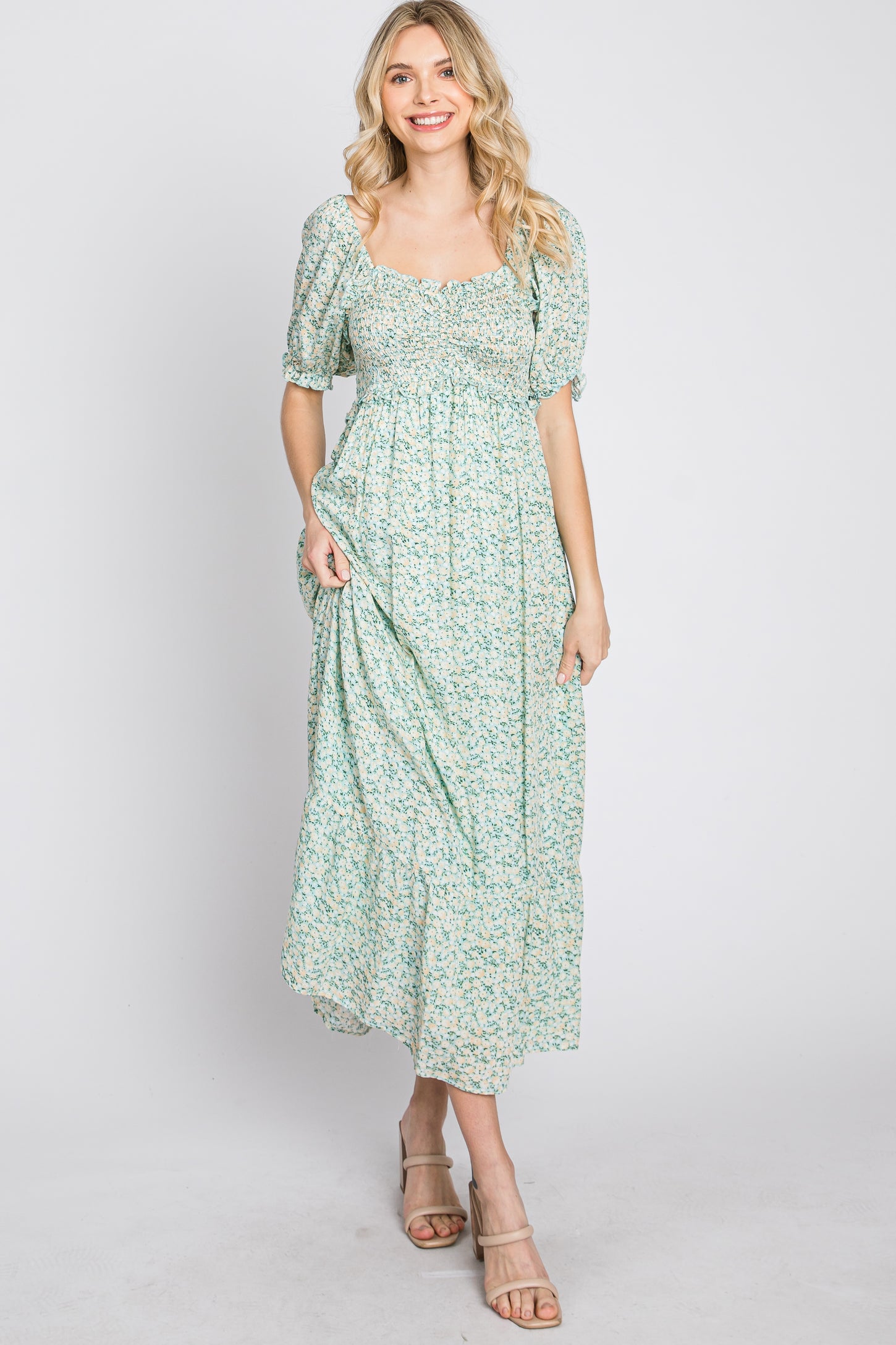 mint floral midi dress Easy breezy, this mint organza midi dress is cut with an effortless silhouette that's belted to flatter the form. Its scarf-inspired floral print lends vibrant appeal ready for fun in the