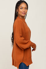 Orange Mock Neck Exposed Seam Sweater