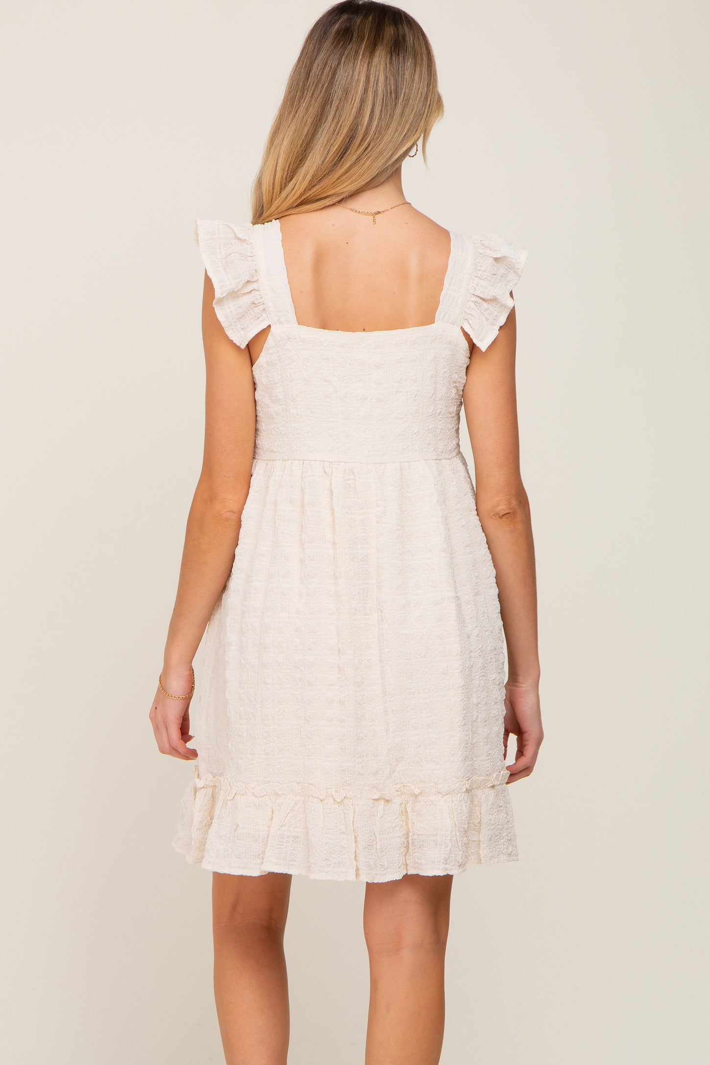 Cream Sleeveless Textured Ruffle Maternity Dress